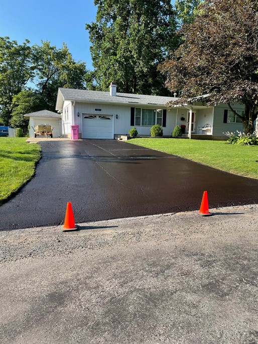 Deep Roots - Asphalt Services - freshly paved driveway - Chatham, IL