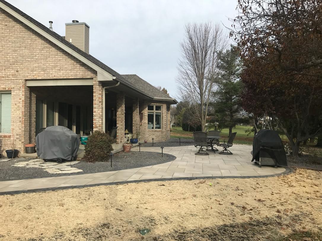Concrete Services, new back patio with rockscaping - Chatham, IL