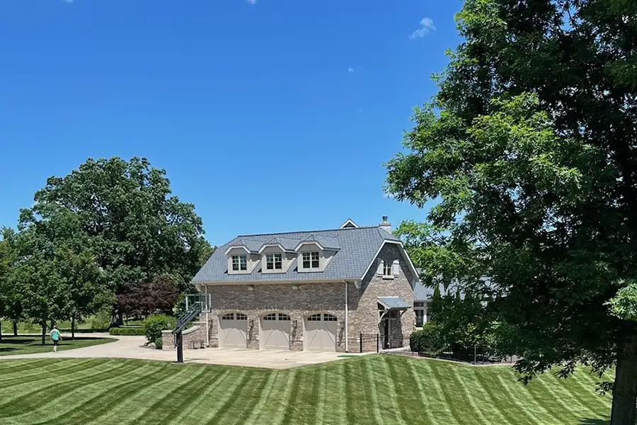 immaculately manicured lawn of luxury home - Chatham, IL